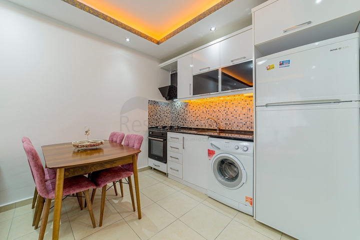 На продажу представлена двухкомнатная квартира в районе Махмутлар