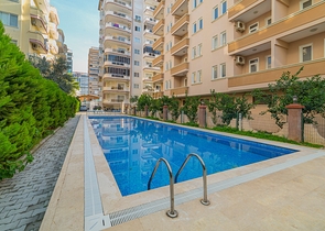 На продажу представлена двухкомнатная квартира в районе Махмутлар