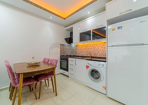 На продажу представлена двухкомнатная квартира в районе Махмутлар