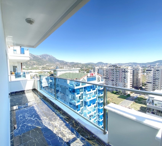 Королевский пентхаус 4+1 в элитном комплексе в районе Махмутлар