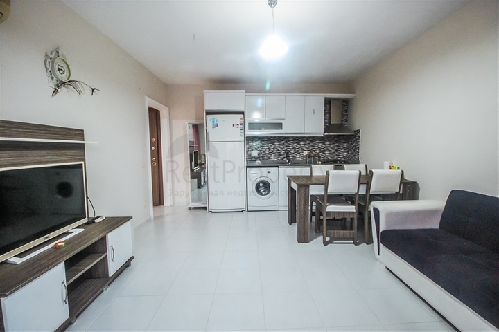 Меблированная квартира 1+1 в центре района Махмутлар