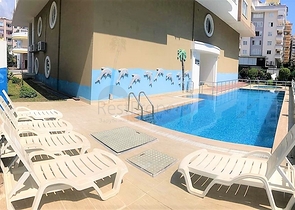 Меблированная квартира 1+1 в центре района Махмутлар