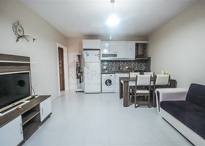 Меблированная квартира 1+1 в центре района Махмутлар