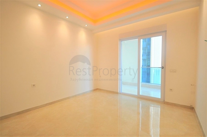 Просторная квартира 1+1 в элитном комплексе в районе Махмутлар