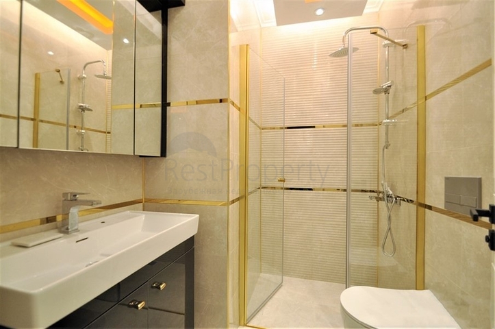 Просторная квартира 1+1 в элитном комплексе в районе Махмутлар