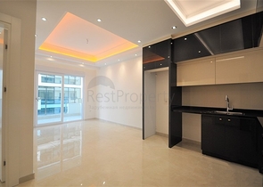 Просторная квартира 1+1 в элитном комплексе в районе Махмутлар