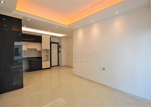 Просторная квартира 1+1 в элитном комплексе в районе Махмутлар