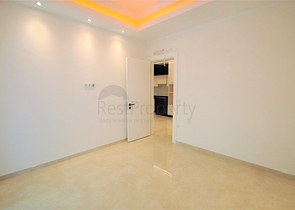 Просторная квартира 1+1 в элитном комплексе в районе Махмутлар