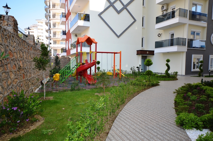 Квартира 2+1 с отдельной кухней в районе Тосмур