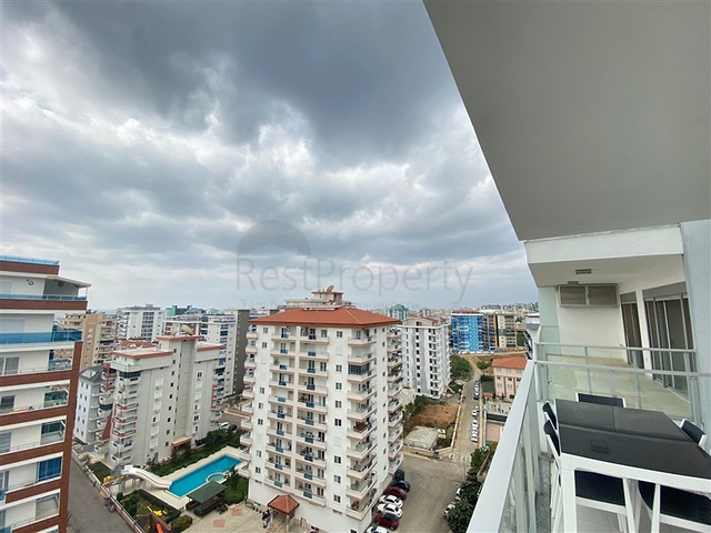 Светлая квартира 2+1 в Махмутларе на высоком этаже