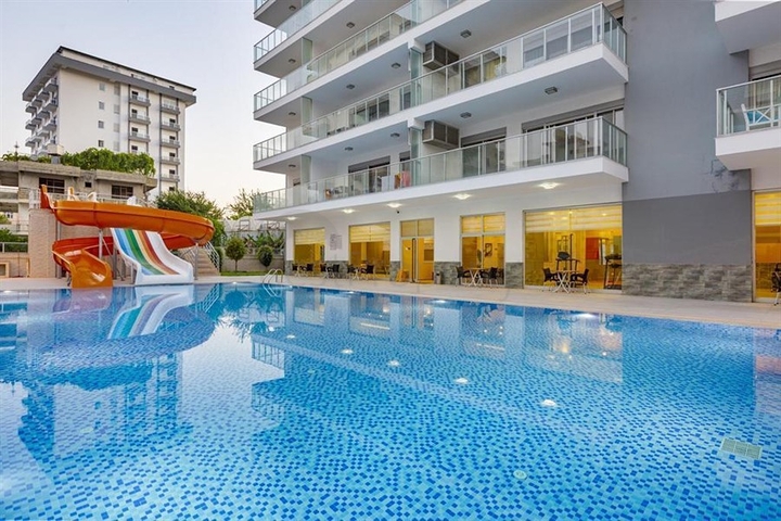 Светлая квартира 2+1 в Махмутларе на высоком этаже