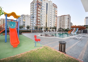 Продается квартира 1+1 в районе Махмутлар