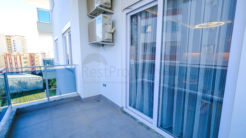 Двухкомнатная квартира в районе Махмутлар