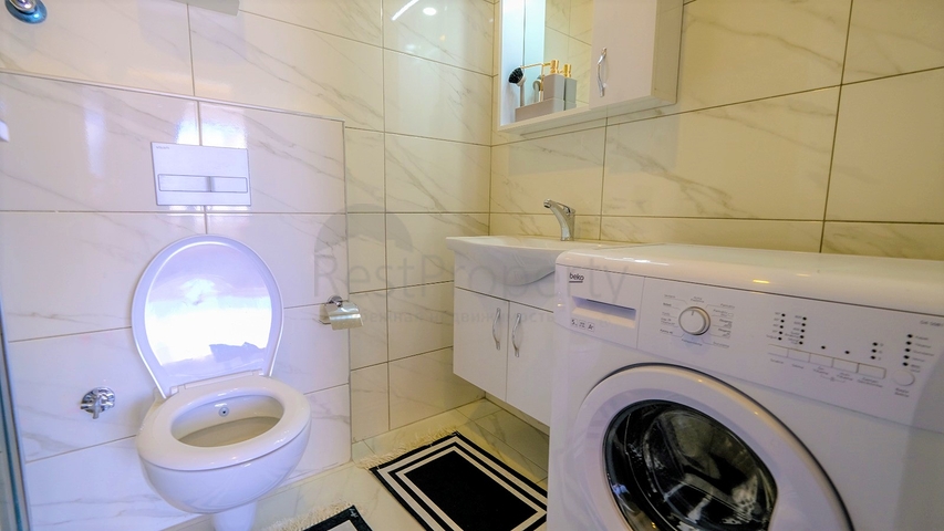 Меблированная квартира 1+1 в современном комплексе в районе Махмутлар