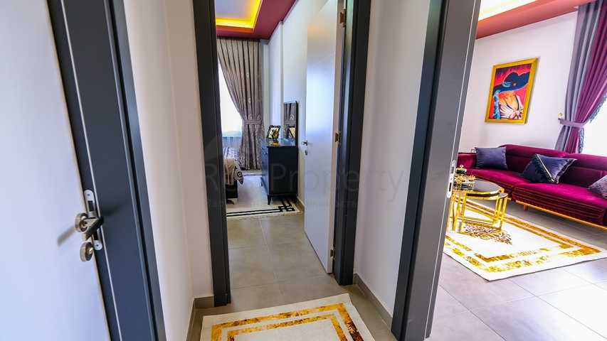 Меблированная квартира 1+1 в современном комплексе в районе Махмутлар