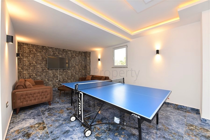 Меблированная квартира 1+1 в современном комплексе в районе Махмутлар