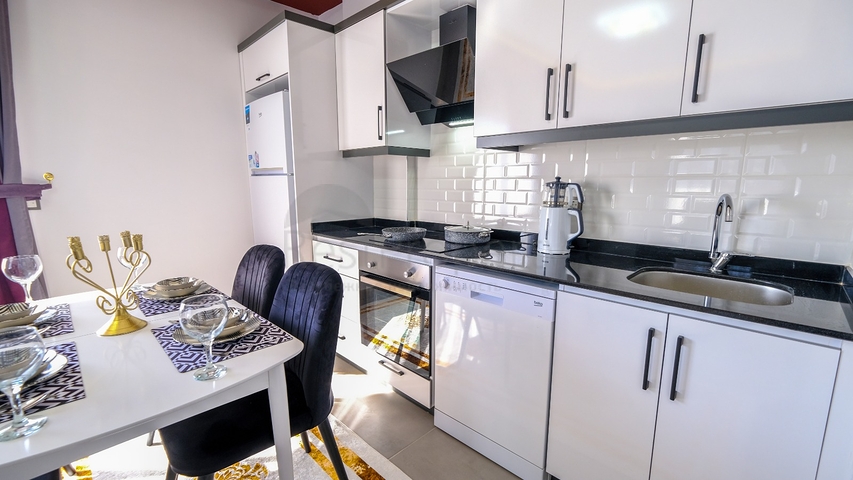 Меблированная квартира 1+1 в современном комплексе в районе Махмутлар