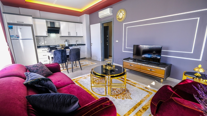 Меблированная квартира 1+1 в современном комплексе в районе Махмутлар