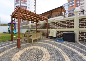 Меблированная квартира 1+1 в современном комплексе в районе Махмутлар