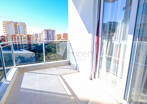 Меблированная квартира 1+1 в современном комплексе в районе Махмутлар