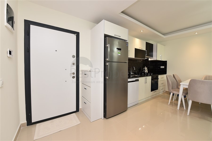 Двухкомнатная квартира с мебелью в районе Авсаллар