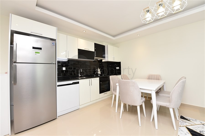 Двухкомнатная квартира с мебелью в районе Авсаллар