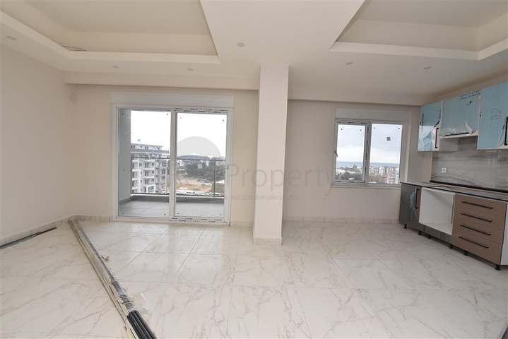 Пентхаус 3+1 с видом на море и горы в районе Авсаллар 