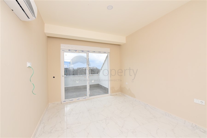 Пентхаус 3+1 с видом на море и горы в районе Авсаллар 