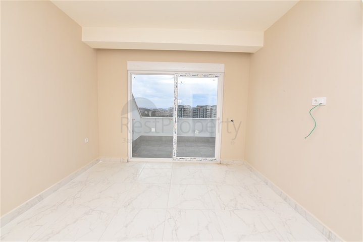 Пентхаус 3+1 с видом на море и горы в районе Авсаллар 