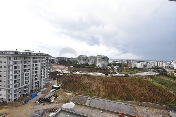 Пентхаус 3+1 с видом на море и горы в районе Авсаллар 