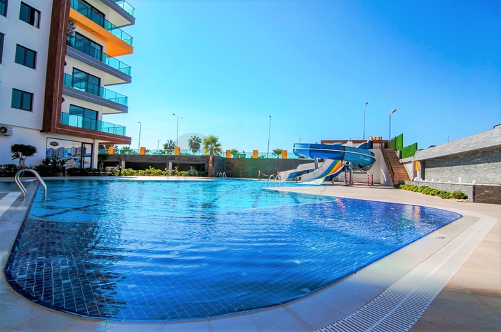 Апартаменты 2+1 на первой береговой в Махмутларе