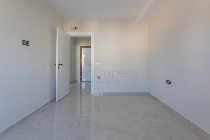 Апартаменты 2+1 на первой береговой в Махмутларе