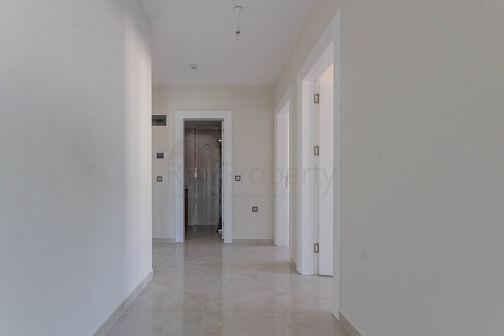 Апартаменты 2+1 на первой береговой в Махмутларе