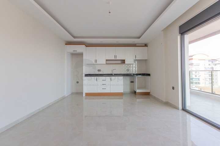 Апартаменты 2+1 на первой береговой в Махмутларе