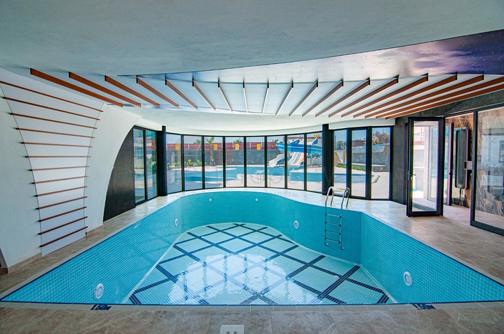 Апартаменты 2+1 на первой береговой в Махмутларе