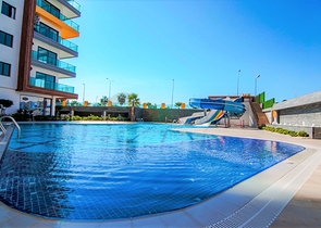 Апартаменты 2+1 на первой береговой в Махмутларе