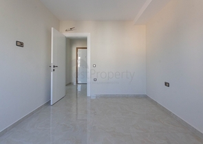 Апартаменты 2+1 на первой береговой в Махмутларе