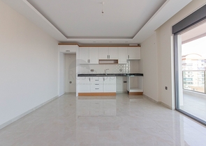 Апартаменты 2+1 на первой береговой в Махмутларе