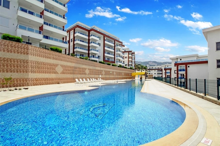 Просторный дуплекс с выходом в сад в районе Каргыджак