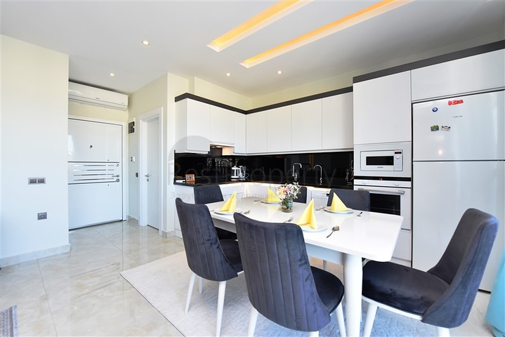 Пентхаус планировкой 2+1 на первой береговой линии в районе Махмутлар