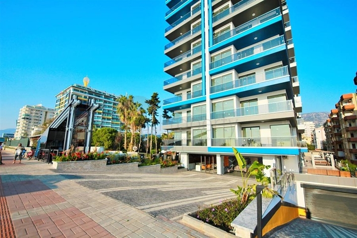 Пентхаус планировкой 2+1 на первой береговой линии в районе Махмутлар