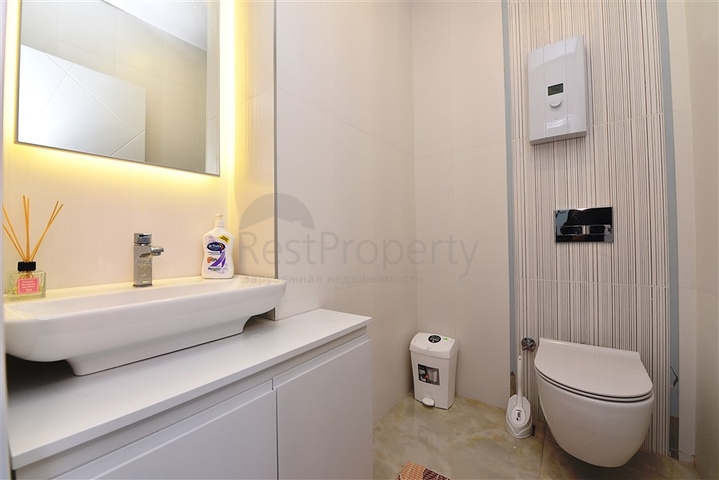 Пентхаус планировкой 2+1 на первой береговой линии в районе Махмутлар