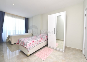 Пентхаус планировкой 2+1 на первой береговой линии в районе Махмутлар