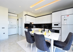 Пентхаус планировкой 2+1 на первой береговой линии в районе Махмутлар