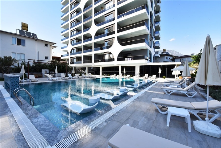 Меблированная двухкомнатная квартира в районе Махмутлар