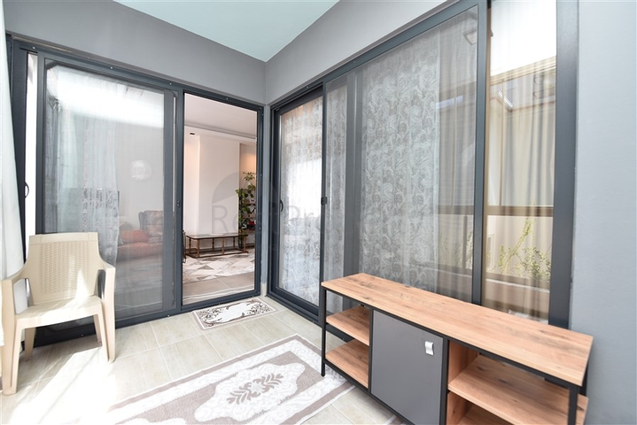 Меблированная двухкомнатная квартира в районе Махмутлар