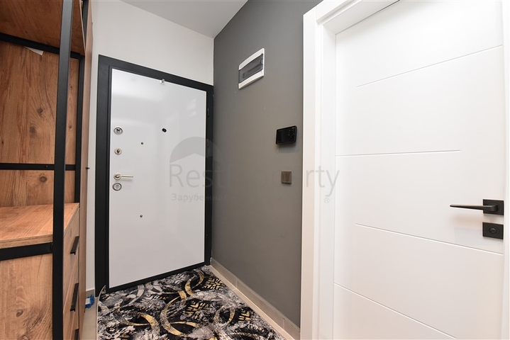 Меблированная двухкомнатная квартира в районе Махмутлар