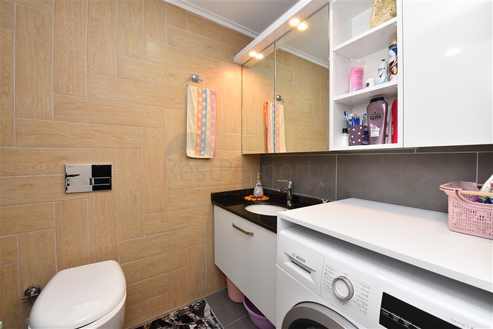 Меблированная двухкомнатная квартира в районе Махмутлар