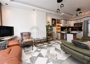 Меблированная двухкомнатная квартира в районе Махмутлар