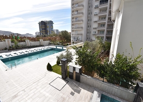 Меблированная двухкомнатная квартира в районе Махмутлар